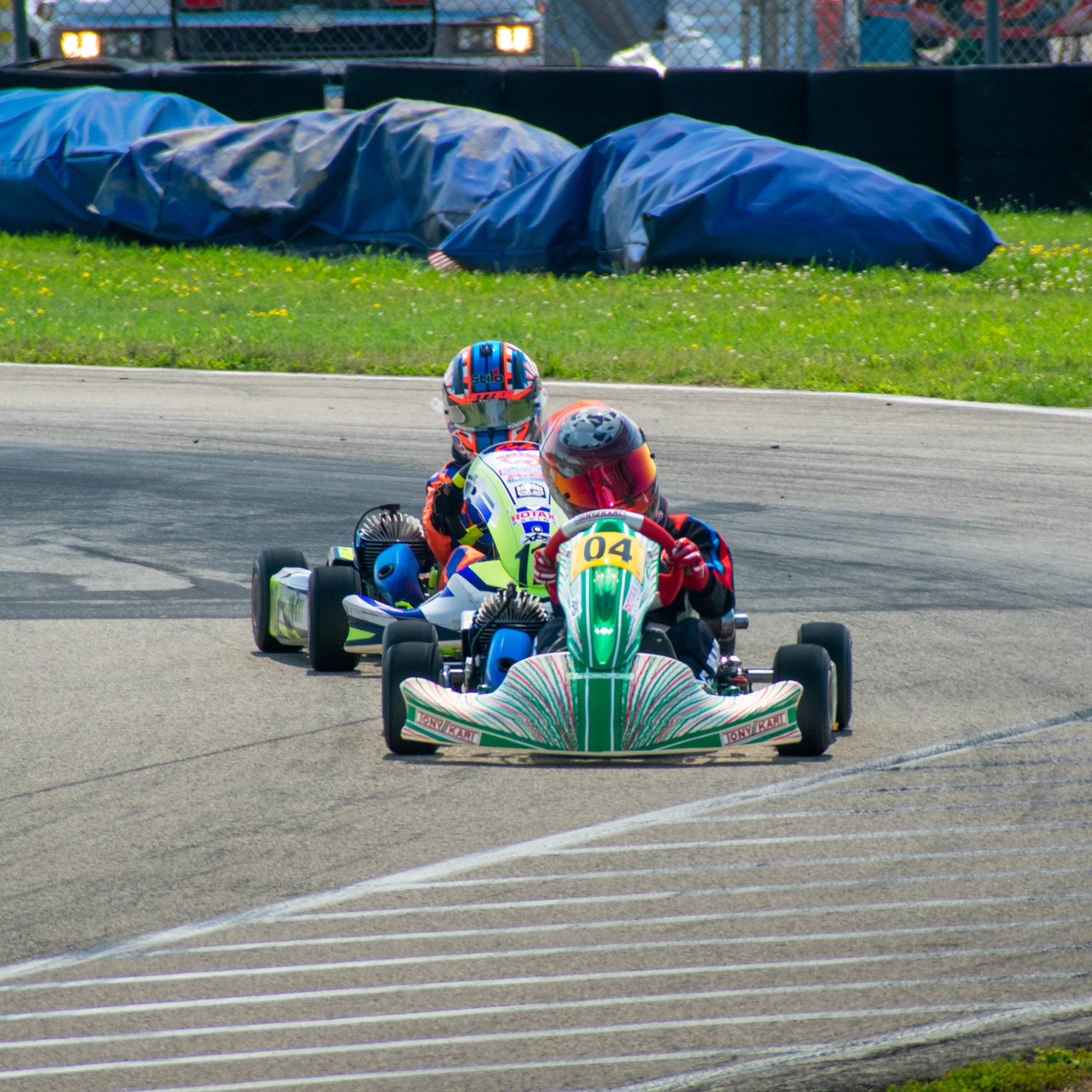 Two Swift Drivers Race Out of Turn One at the Pitt Race Karting Track Near Pittsburgh.