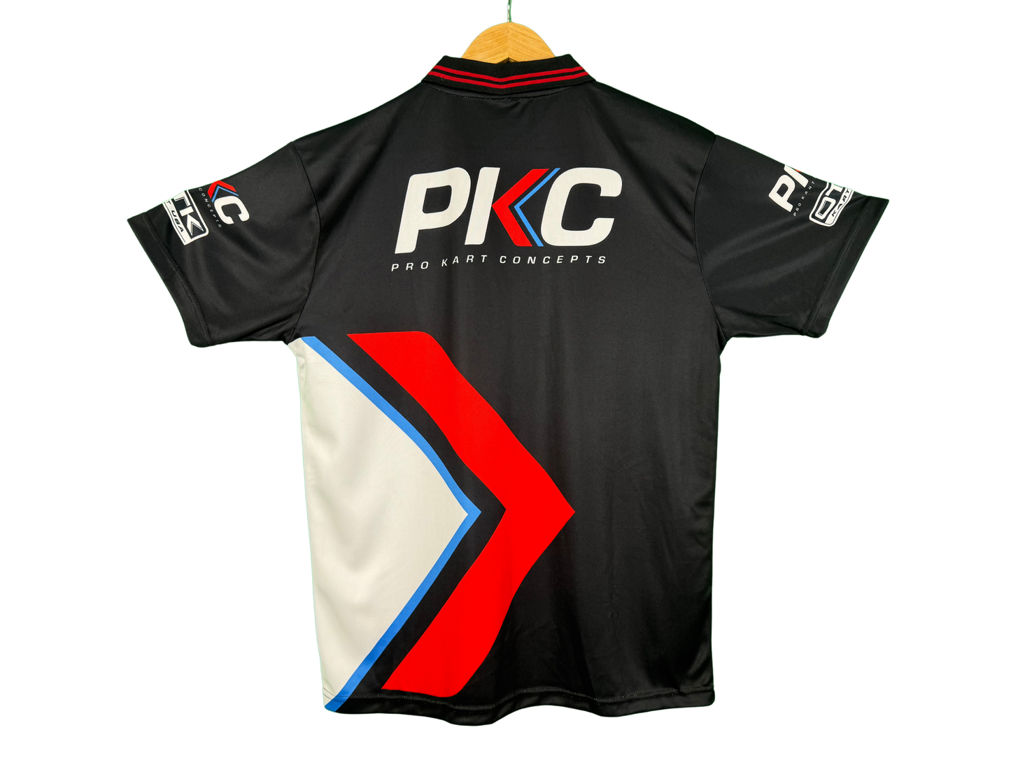 Back of a 2025 PKC Dye Sublimated Full Print Mesh Crew Polo.