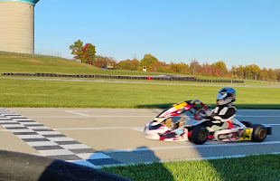 A Speed Concepts OTK Kart Races Down the Front Straight at Pittsburgh International Race Complex's Wilson Karting Circuit.